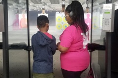 Black_Boy_and_Mom_Gun_Traing